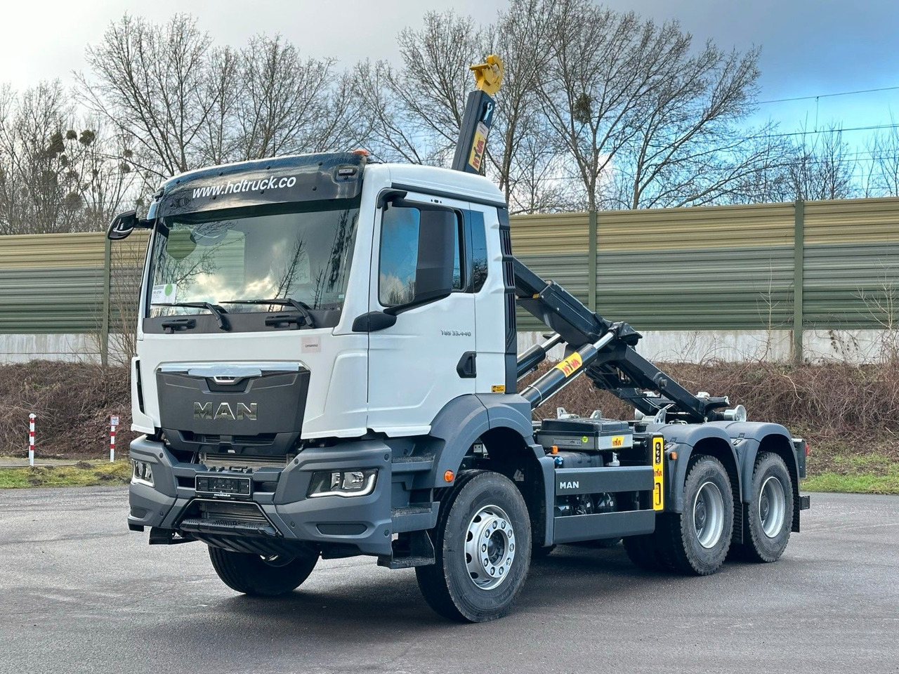MAN TGS 33.440 6x4 Euro6e Abrollkipper Hyva - Hook lift truck, Crane truck: picture 1 MAN TGS 33.440 6x4 Euro6e Abrollkipper Hyva - Hook lift truck, Crane truck: picture 1