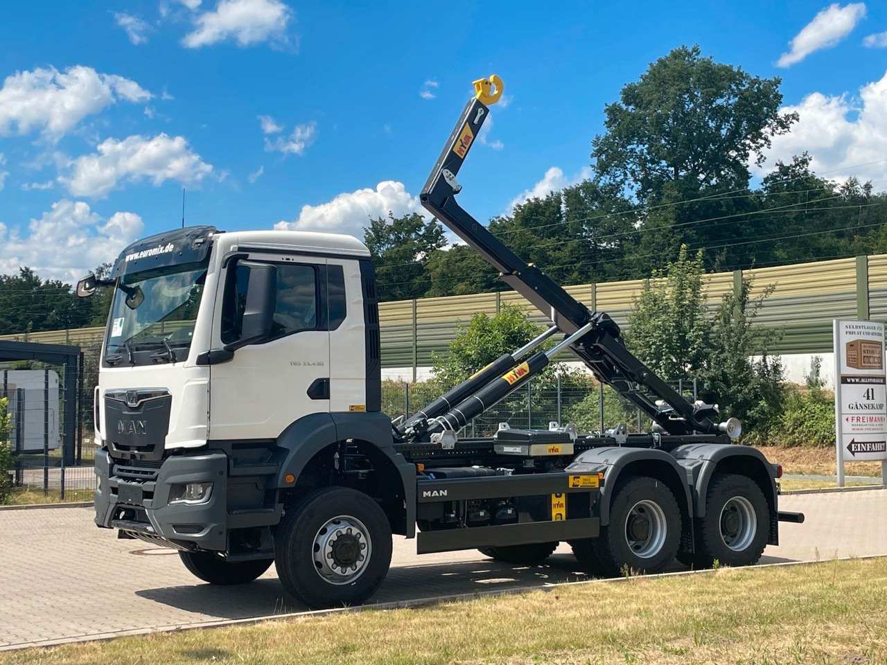 MAN TGS 33.440 6x6 Euro6e Hyva - Hiab MultiLift - Hook lift truck, Crane truck: picture 2 MAN TGS 33.440 6x6 Euro6e Hyva - Hiab MultiLift - Hook lift truck, Crane truck: picture 2