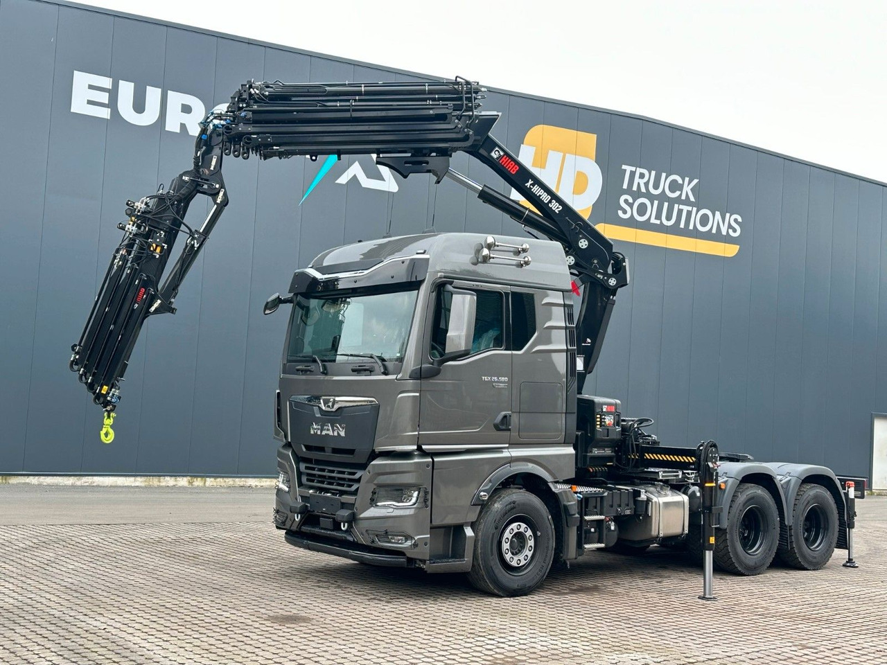 MAN TGX 26.580 6x4 Kran Hiab 302-6 + Jib-4 - Tractor unit: picture 1 MAN TGX 26.580 6x4 Kran Hiab 302-6 + Jib-4 - Tractor unit: picture 1