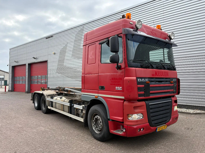 DAF XF 105 . 410 / 6X2 / MULTILIFT XR 26S61 / APK - TUV OKTOBER 2025 / EURO 5 / AUTOMAAT / - Hook lift truck: picture 1 DAF XF 105 . 410 / 6X2 / MULTILIFT XR 26S61 / APK - TUV OKTOBER 2025 / EURO 5 / AUTOMAAT / - Hook lift truck: picture 1