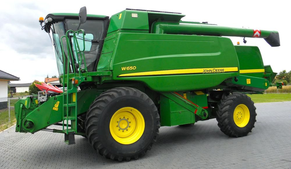 John Deere W650 2008 Rok, heder 6,7m, Nie Malowany, Stan Bardzo Dobry - Combine harvester: picture 1 John Deere W650 2008 Rok, heder 6,7m, Nie Malowany, Stan Bardzo Dobry - Combine harvester: picture 1
