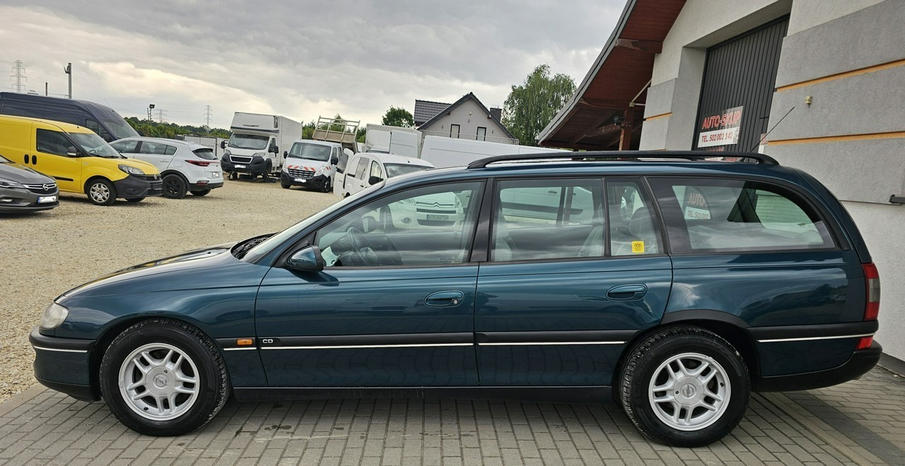Opel Omega B 2,5 v6 *automat* napęd tył *welury* - Station wagon: picture 4 Opel Omega B 2,5 v6 *automat* napęd tył *welury* - Station wagon: picture 4