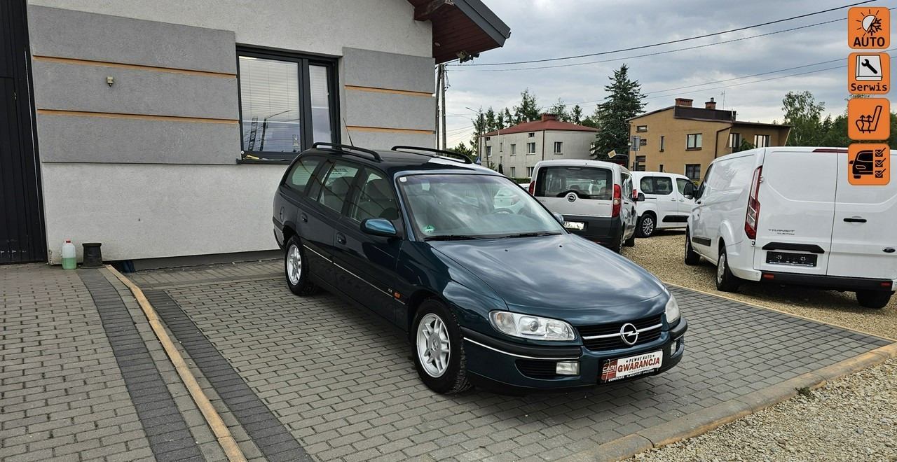 Opel Omega B 2,5 v6 *automat* napęd tył *welury* - Station wagon: picture 1 Opel Omega B 2,5 v6 *automat* napęd tył *welury* - Station wagon: picture 1