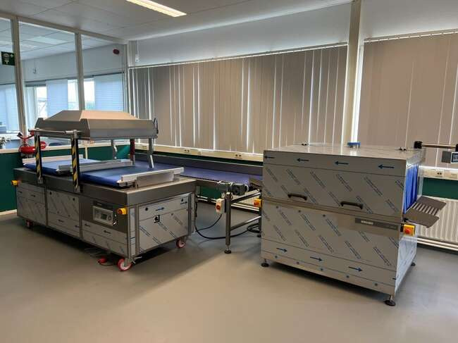 Henkelman automatic vacuum line Titaan 2-90 - Packaging machinery: picture 1 Henkelman automatic vacuum line Titaan 2-90 - Packaging machinery: picture 1