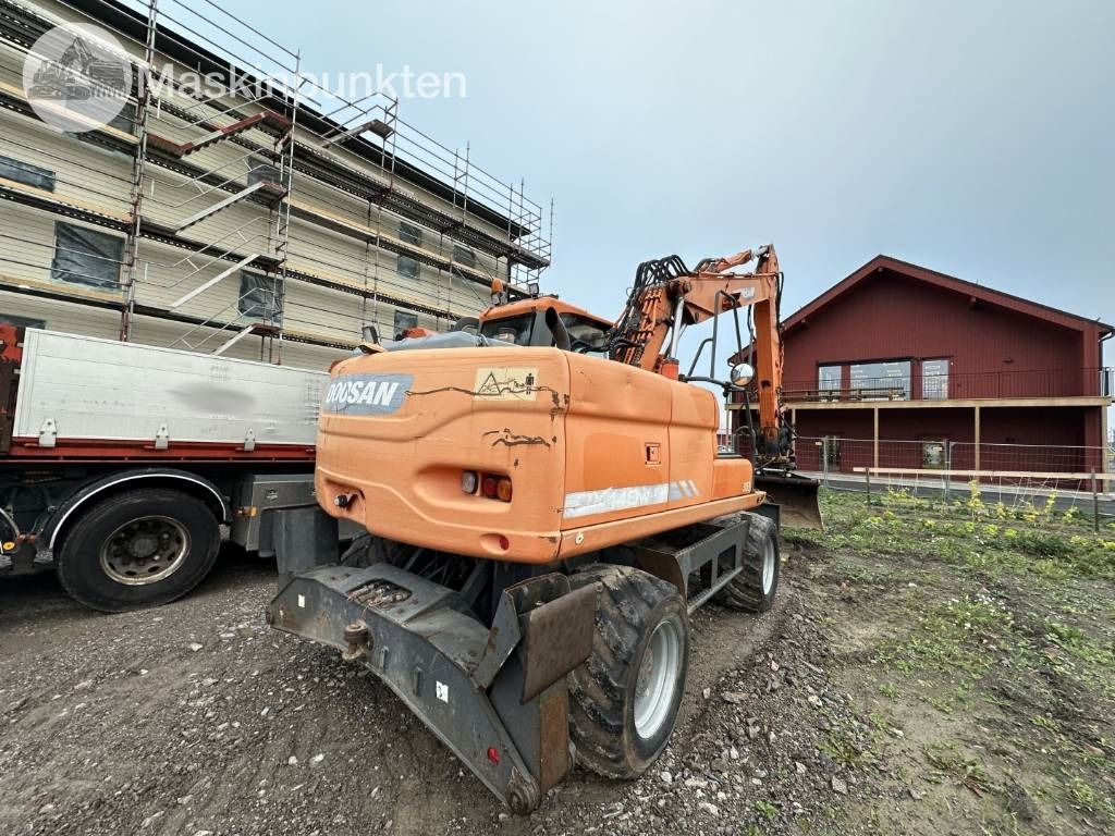 Doosan DX 140 W med vagn och redskap - Wheel excavator: picture 4 Doosan DX 140 W med vagn och redskap - Wheel excavator: picture 4