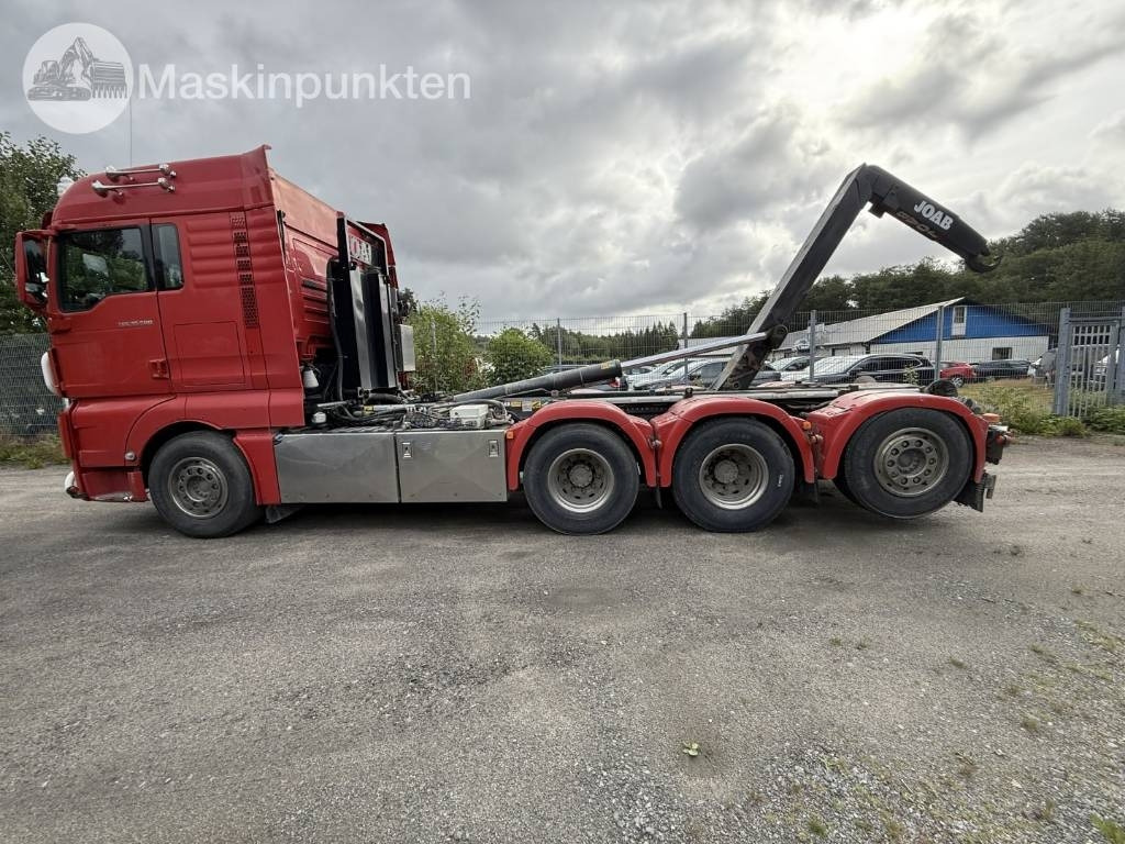 MAN TGX 35.500 EKIPAGE - Hook lift truck: picture 1 MAN TGX 35.500 EKIPAGE - Hook lift truck: picture 1