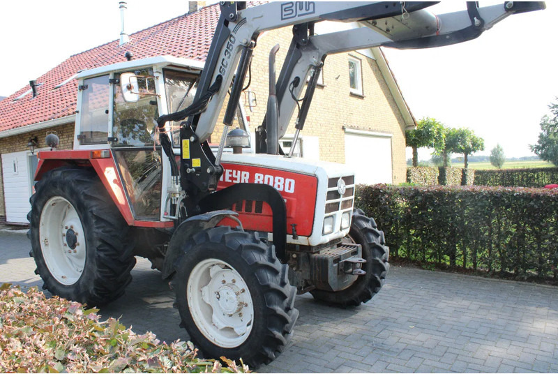 Steyr 8080 met voorlader 40 kmh - Farm tractor: picture 1 Steyr 8080 met voorlader 40 kmh - Farm tractor: picture 1