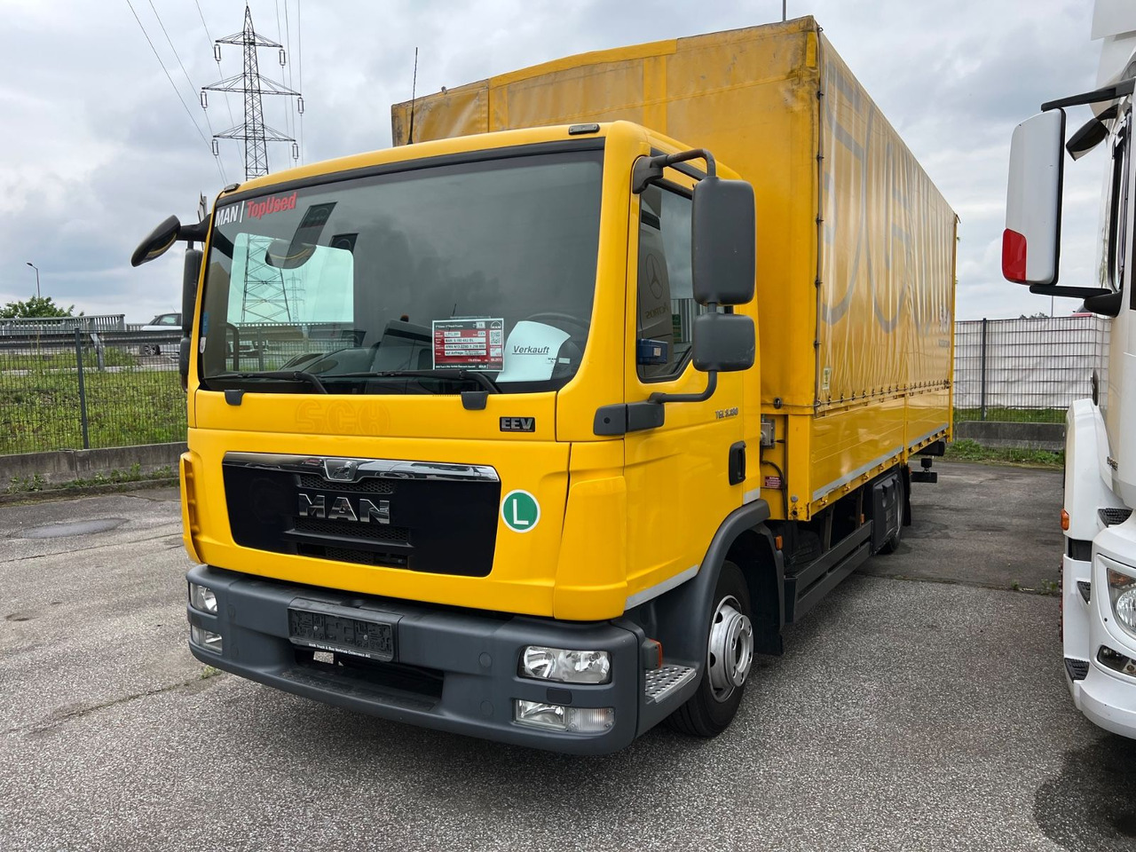 MAN TGL 8 180 - Curtainsider truck: picture 1 MAN TGL 8 180 - Curtainsider truck: picture 1