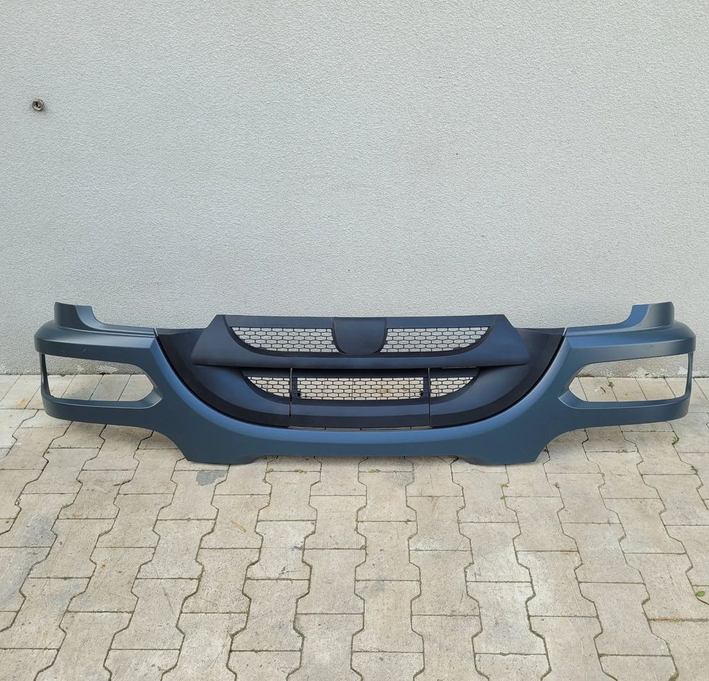 PAS GRILL DAF LF EURO6 ORYGINAŁ ACAS256 CHWALIM116 - Body and exterior for Truck: picture 1 PAS GRILL DAF LF EURO6 ORYGINAŁ ACAS256 CHWALIM116 - Body and exterior for Truck: picture 1