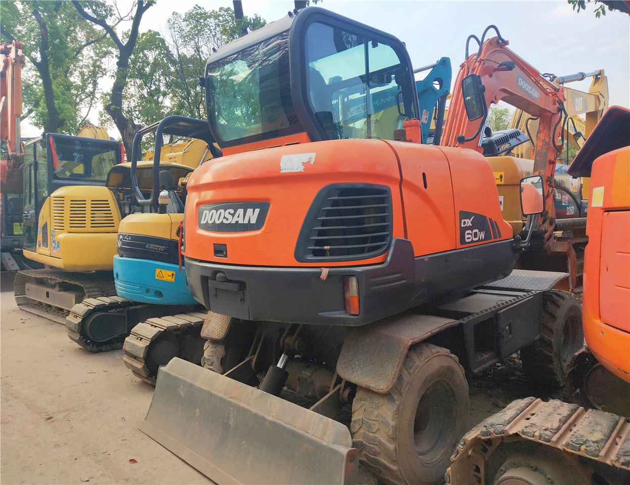 DOOSAN Mini Excavator DX60W Click Here for Discount - Mini excavator: picture 1 DOOSAN Mini Excavator DX60W Click Here for Discount - Mini excavator: picture 1