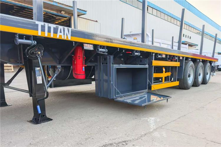 TITAN 3 Axle Flatbed Trailer Truck With Wooden Piles Price In Guma - Container transporter/ Swap body semi-trailer: picture 4 TITAN 3 Axle Flatbed Trailer Truck With Wooden Piles Price In Guma - Container transporter/ Swap body semi-trailer: picture 4