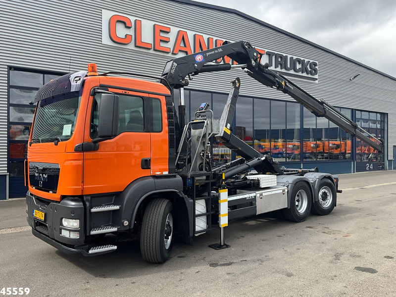 MAN TGS 26.360 Euro 5 6x4H HMF 15 Tonmeter laadkraan - Hook lift truck, Crane truck: picture 1 MAN TGS 26.360 Euro 5 6x4H HMF 15 Tonmeter laadkraan - Hook lift truck, Crane truck: picture 1