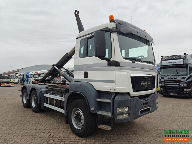 MAN TGS-TGX 26.440 6x4 Dagcabine Euro5 - AJK 20T HaakarmSysteem - Volledig Bladgeveerd - Naafreductie - Handgeschakeld - Hook lift truck: picture 4 MAN TGS-TGX 26.440 6x4 Dagcabine Euro5 - AJK 20T HaakarmSysteem - Volledig Bladgeveerd - Naafreductie - Handgeschakeld - Hook lift truck: picture 4