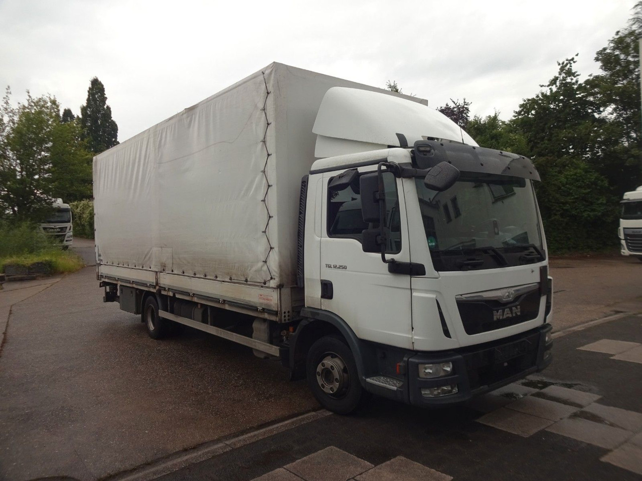 MAN TGL 12.250, Pr+Pl, LBW, Klima, Automat, AHK - Curtainsider truck: picture 1 MAN TGL 12.250, Pr+Pl, LBW, Klima, Automat, AHK - Curtainsider truck: picture 1