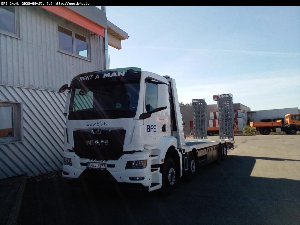 MAN TGS (TG3) 35.430 8x2-6 BL CH Plattform Aufbau mi - Tow truck: picture 1 MAN TGS (TG3) 35.430 8x2-6 BL CH Plattform Aufbau mi - Tow truck: picture 1