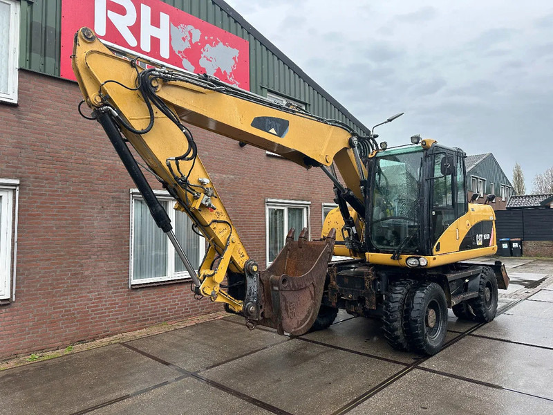 Caterpillar M313D 7212 HOURS - Wheel excavator: picture 2 Caterpillar M313D 7212 HOURS - Wheel excavator: picture 2