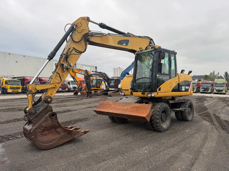 Caterpillar M313D 7212 HOURS - Wheel excavator: picture 4 Caterpillar M313D 7212 HOURS - Wheel excavator: picture 4