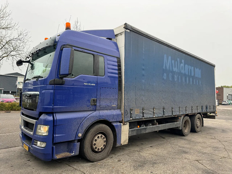 MAN TGX 26.400 6X2 - EURO 4 + LIFT + STEERING AXLE + TÜV 10-2025 - Curtainsider truck: picture 1 MAN TGX 26.400 6X2 - EURO 4 + LIFT + STEERING AXLE + TÜV 10-2025 - Curtainsider truck: picture 1