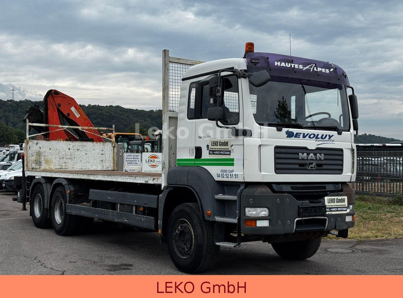 MAN TGA 33.360 - Dropside/ Flatbed truck, Crane truck: picture 1 MAN TGA 33.360 - Dropside/ Flatbed truck, Crane truck: picture 1
