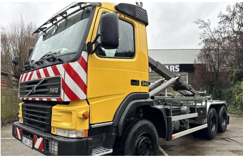 Volvo FM12 6x6 Hook lift - Hook lift truck: picture 1 Volvo FM12 6x6 Hook lift - Hook lift truck: picture 1