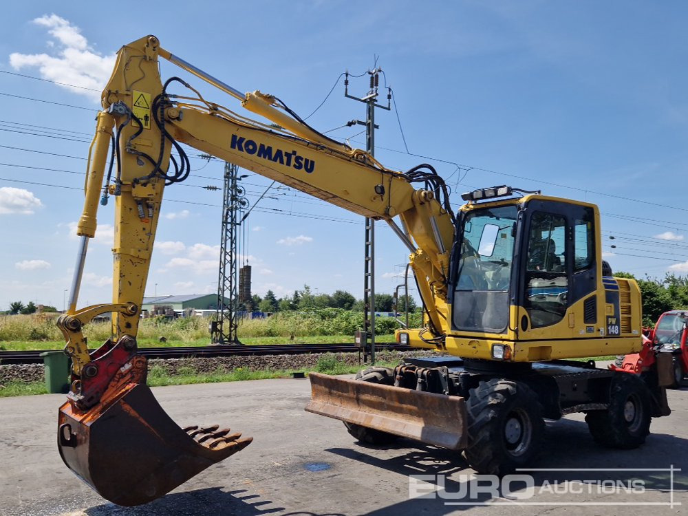 2011 Komatsu PW148-8 - Wheel excavator: picture 1 2011 Komatsu PW148-8 - Wheel excavator: picture 1