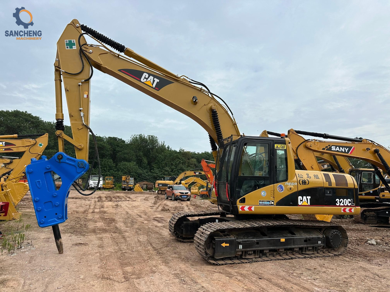 CAT 320CL with hammer crawler excavator - Crawler excavator: picture 1 CAT 320CL with hammer crawler excavator - Crawler excavator: picture 1