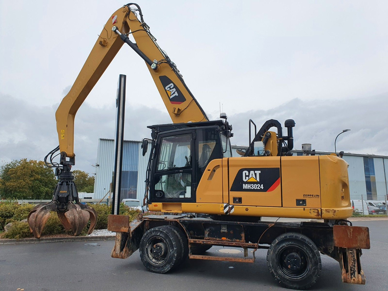 CAT MH3024 / MH 3024 / Greifer / 2018 / 9.424h - Wheel excavator: picture 4 CAT MH3024 / MH 3024 / Greifer / 2018 / 9.424h - Wheel excavator: picture 4