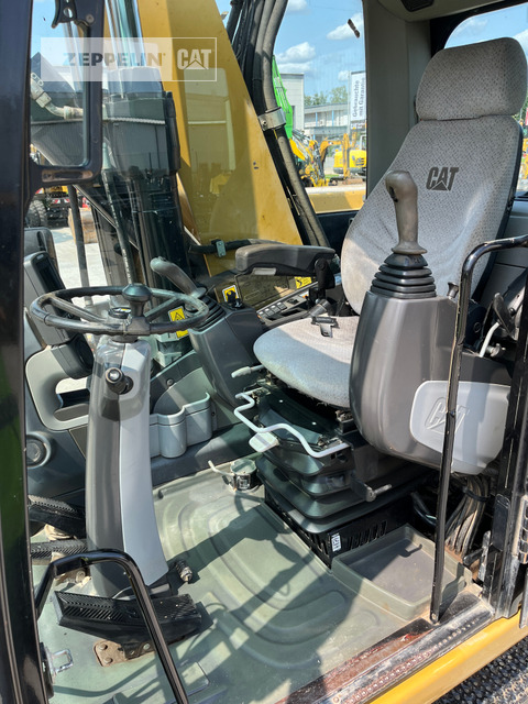Wheel excavator Cat M318D: picture 21