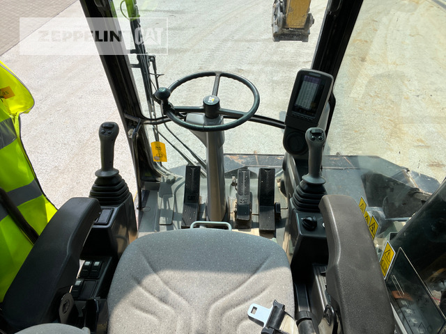 Wheel excavator Cat M318D: picture 22