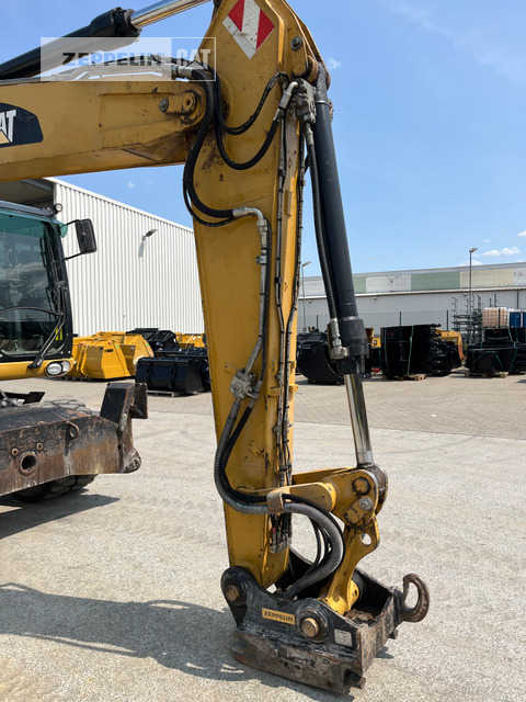 Wheel excavator Cat M318D: picture 15