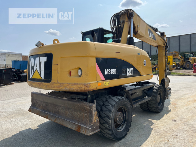 Wheel excavator Cat M318D: picture 6