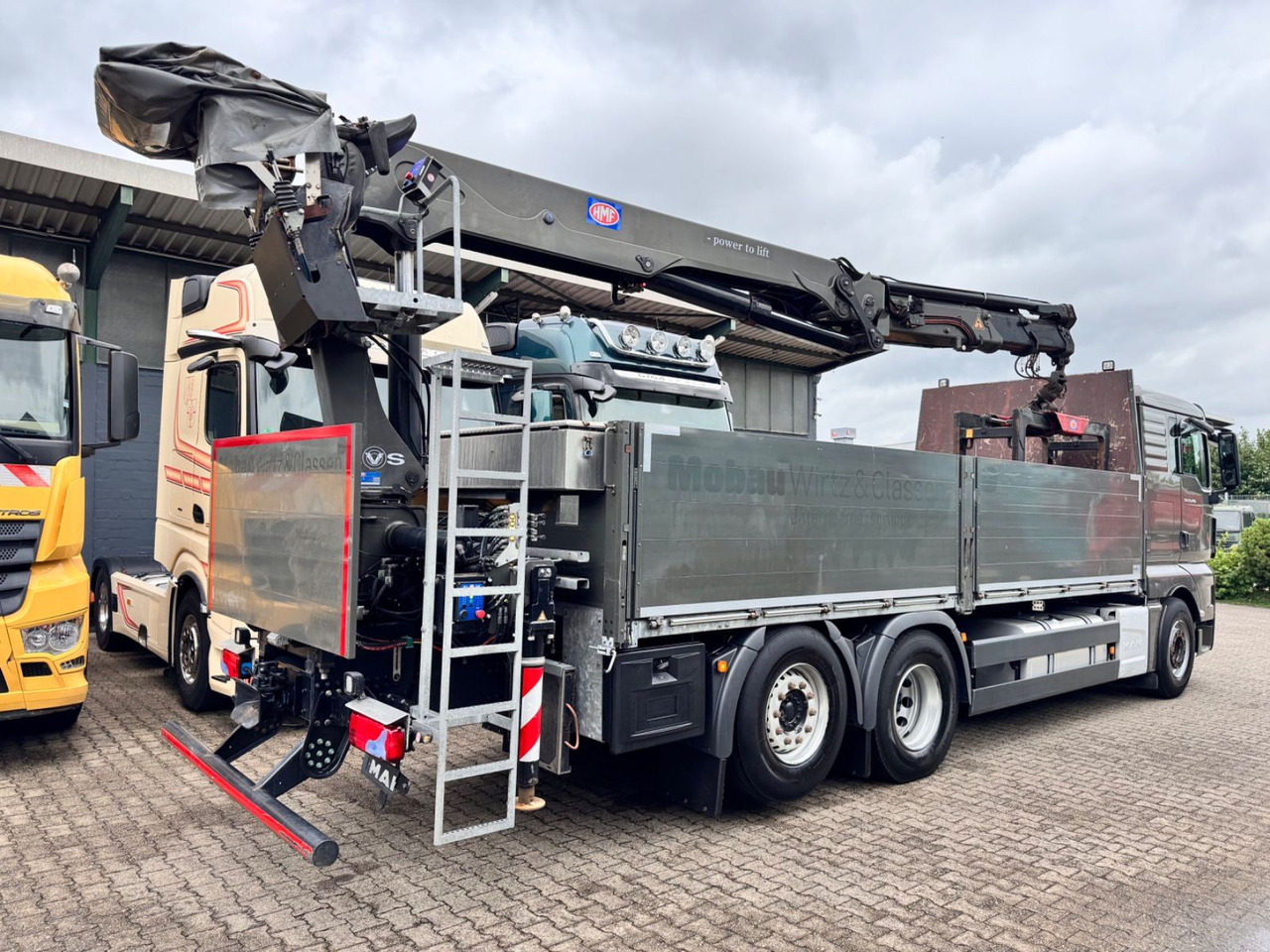 MAN 26.460 TGX Baustoffkran HMF 2110-L3 - Crane truck: picture 3 MAN 26.460 TGX Baustoffkran HMF 2110-L3 - Crane truck: picture 3