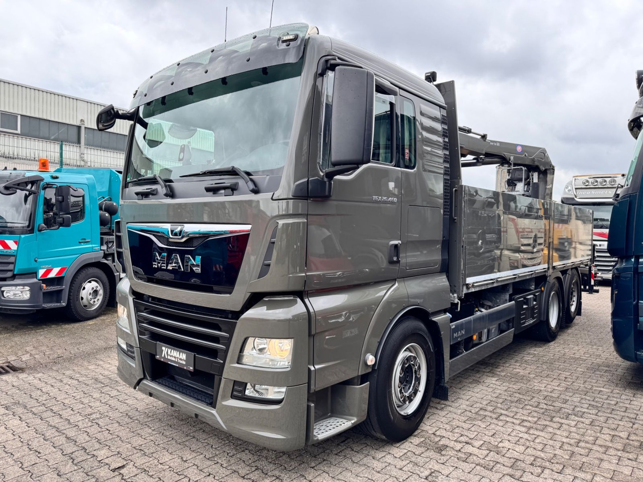 MAN 26.460 TGX Baustoffkran HMF 2110-L3 - Crane truck: picture 2 MAN 26.460 TGX Baustoffkran HMF 2110-L3 - Crane truck: picture 2